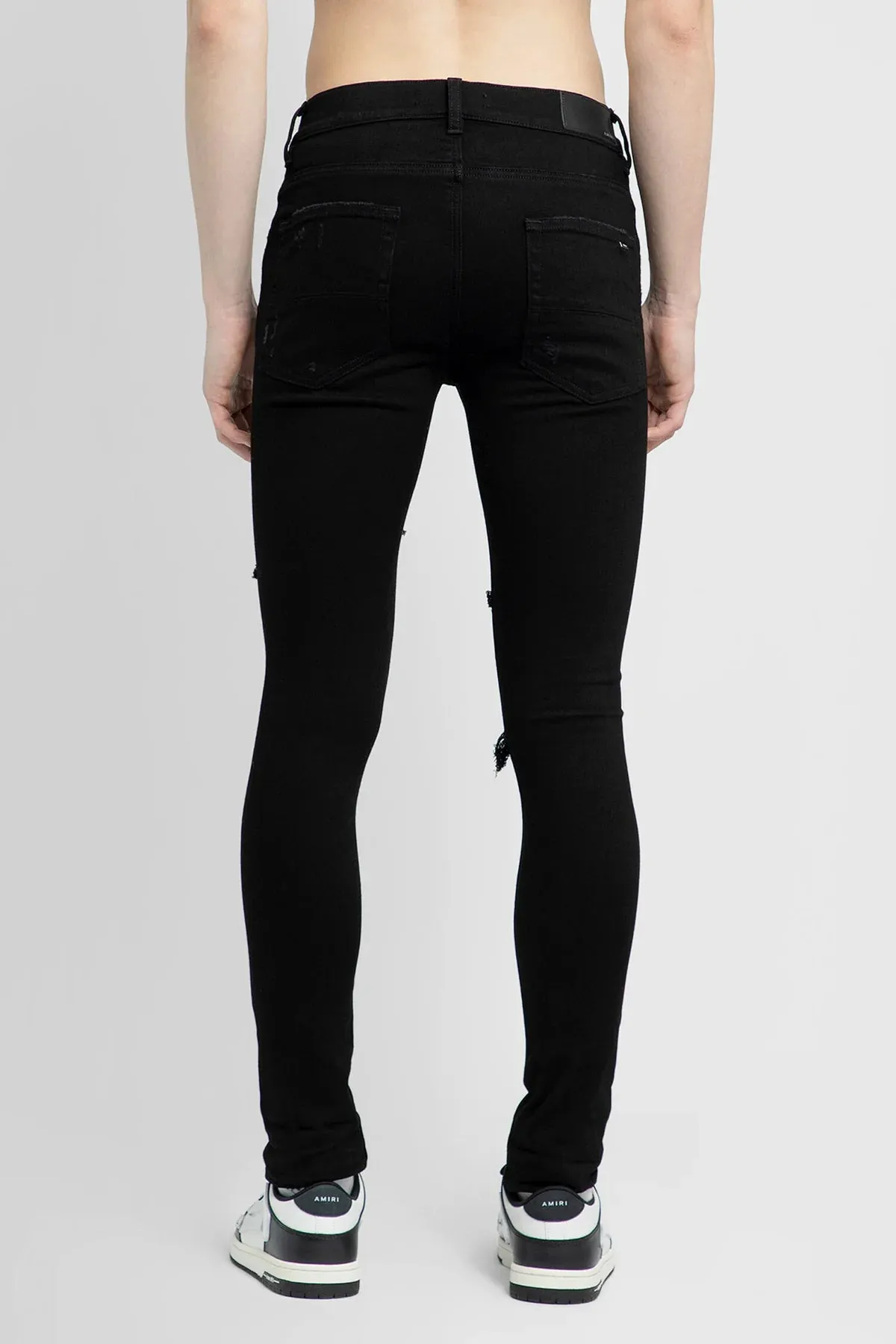 Amiri men's aged black thrasher jeans