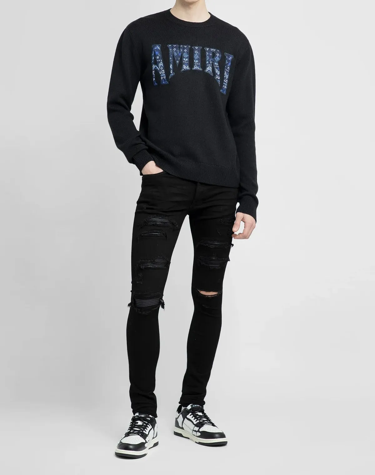 Amiri men's aged black thrasher jeans