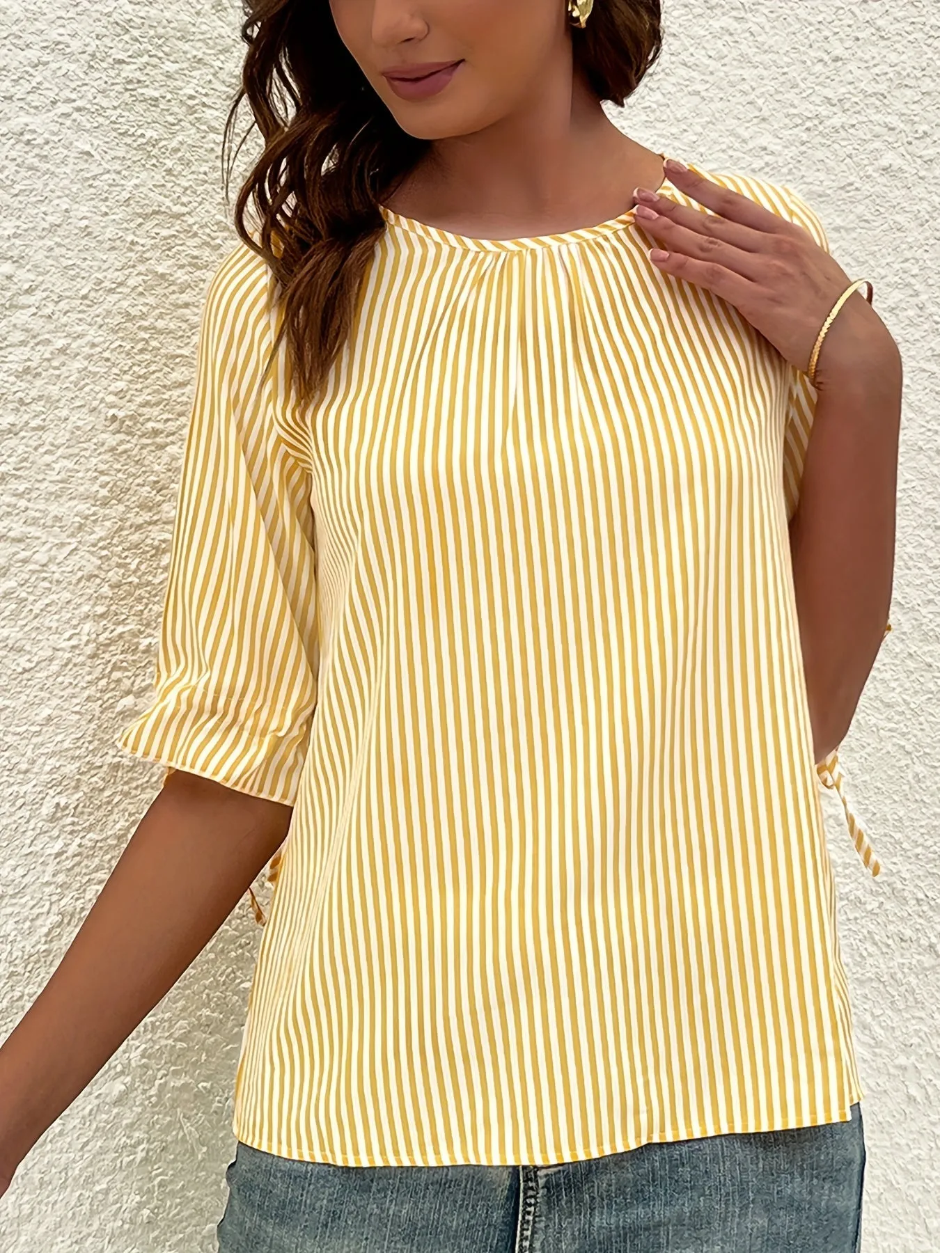 Brena® | Elegant Striped Blouse With A Round Neck And Button Details