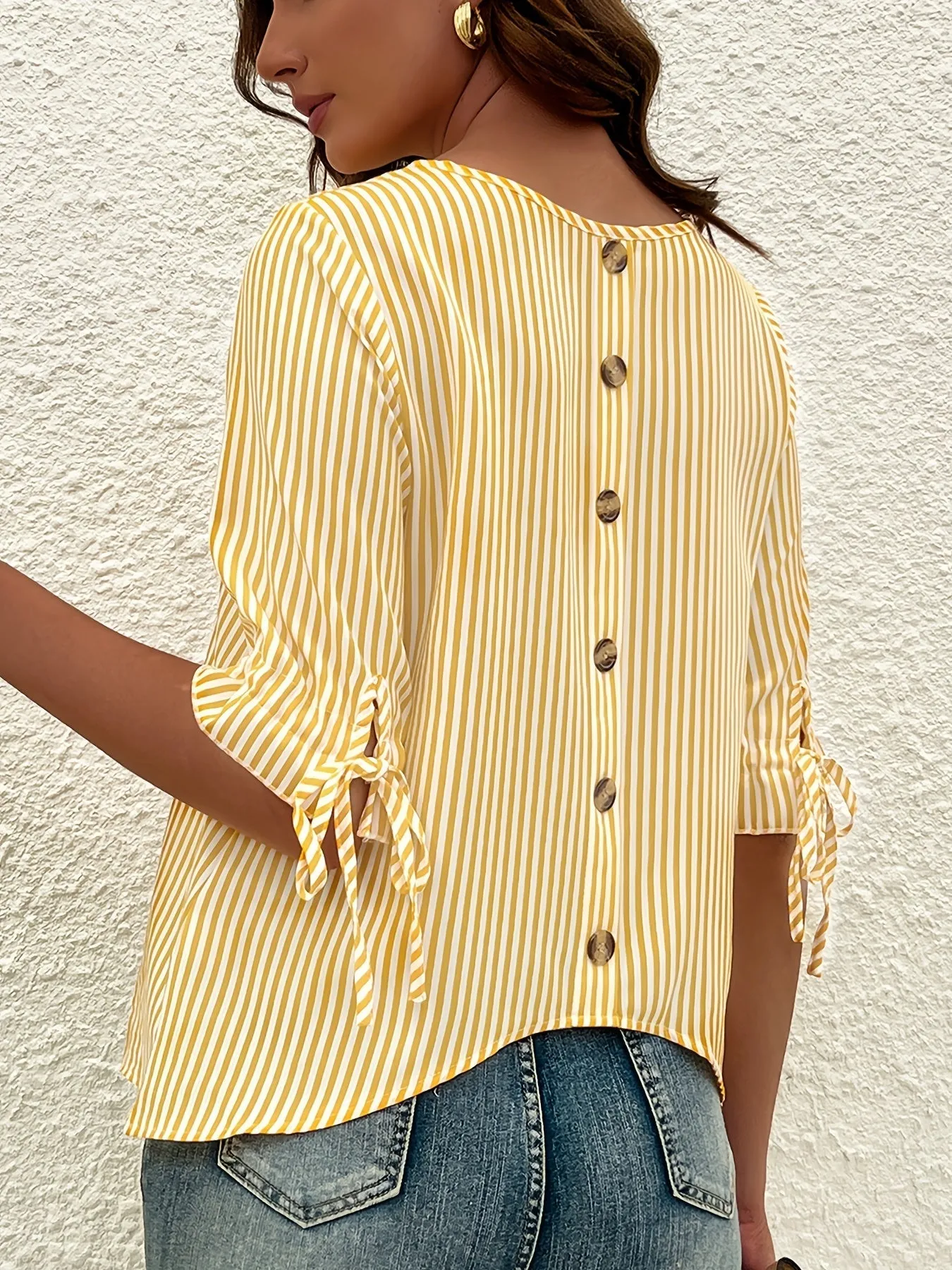 Brena® | Elegant Striped Blouse With A Round Neck And Button Details