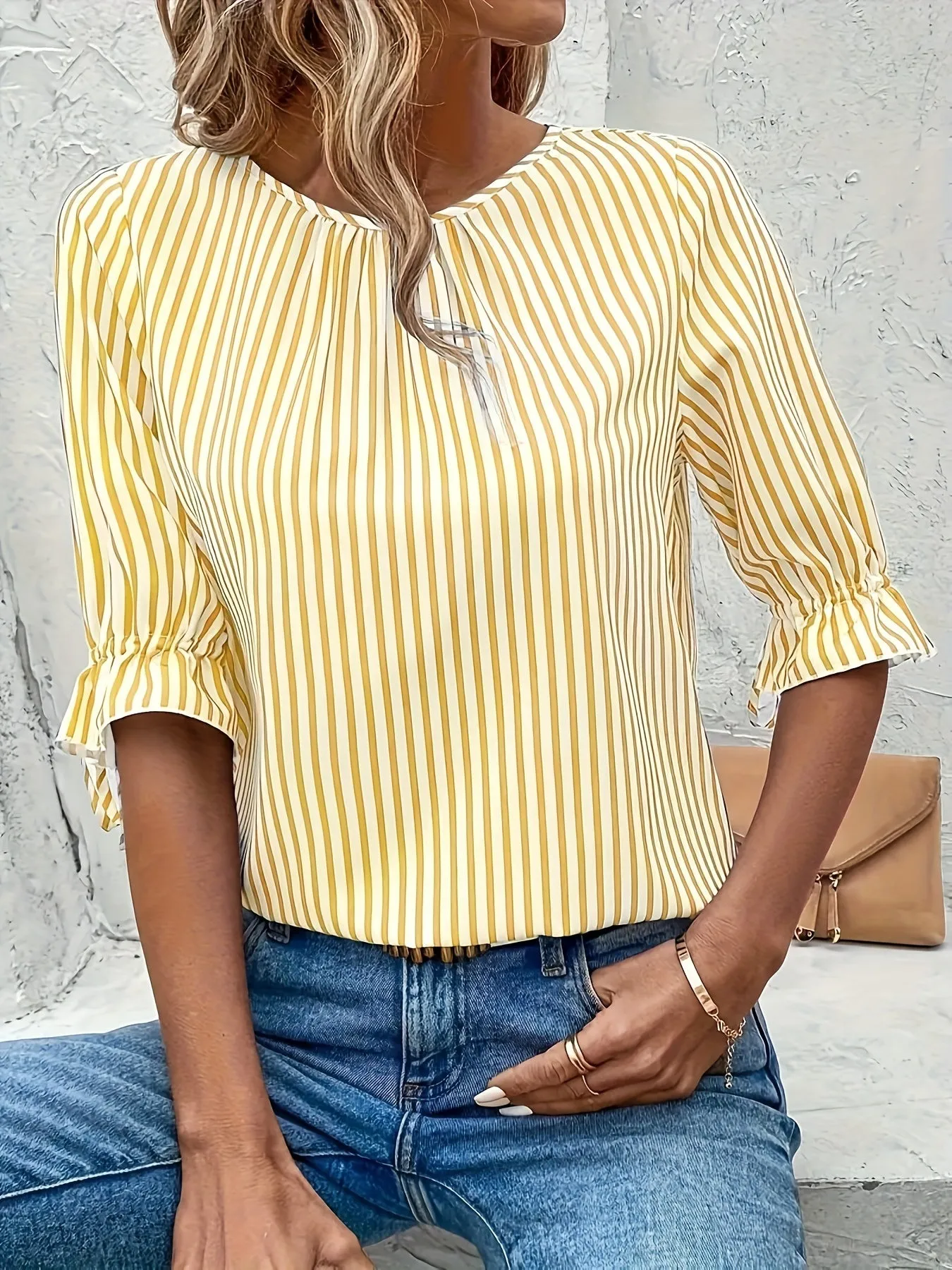 Brena® | Elegant Striped Blouse With A Round Neck And Button Details