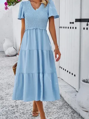 Diantha - Plain casual dress with V-neckline and short sleeves.